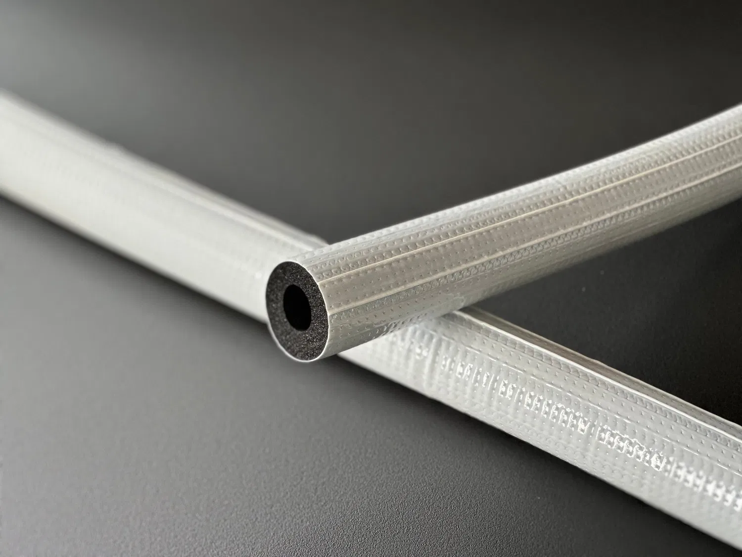 Fireproof NBR Rubber Foam Insulation Pipe with Film UV Resistance Good Quality Insulation Pipe with 